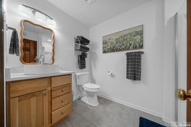 103 River Bend Rd, Hot Springs, AR 71913 - bathroom featuring toilet, vanity, and baseboards