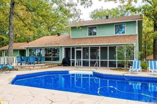 103 River Bend Rd, Hot Springs, AR 71913 - view of swimming pool with a fenced in pool, a patio area, and a sunroom