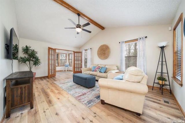 103 River Bend Rd, Hot Springs, AR 71913 - living area featuring lofted ceiling with beams, baseboards, wood finished floors, and ceiling fan