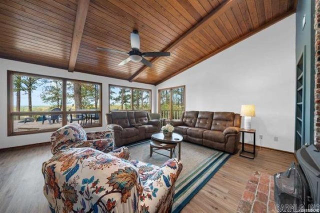 103 River Bend Rd, Hot Springs, AR 71913 - living area featuring baseboards, beamed ceiling, wood ceiling, wood finished floors, and a ceiling fan