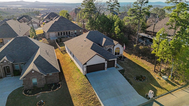 bird's eye view featuring a mountain view and a residential view