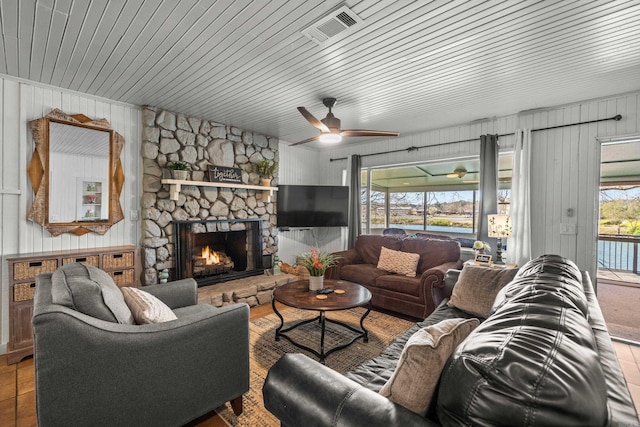 205 Ledgerock, Hot Springs, AR 71913 - living area with visible vents, a stone fireplace, and ceiling fan