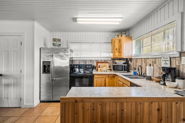 205 Ledgerock, Hot Springs, AR 71913 - kitchen featuring light countertops, light tile patterned floors, a peninsula, stainless steel appliances, and a sink