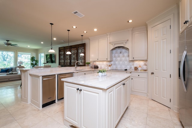 33 Greathouse Bend Dr, Little Rock, AR 72207 - kitchen featuring a peninsula, a sink, open floor plan, visible vents, and appliances with stainless steel finishes