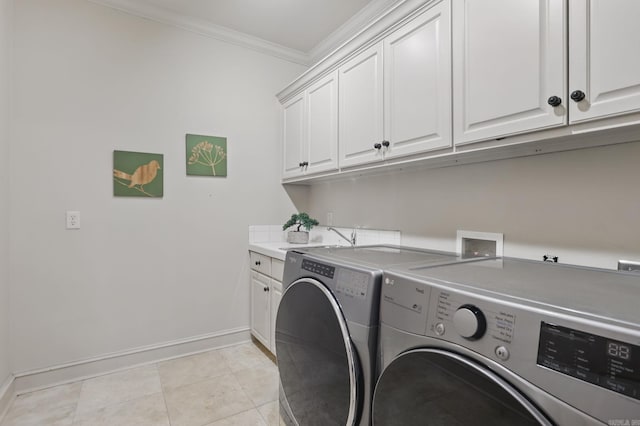 33 Greathouse Bend Dr, Little Rock, AR 72207 - washroom featuring ornamental molding, separate washer and dryer, baseboards, and cabinet space