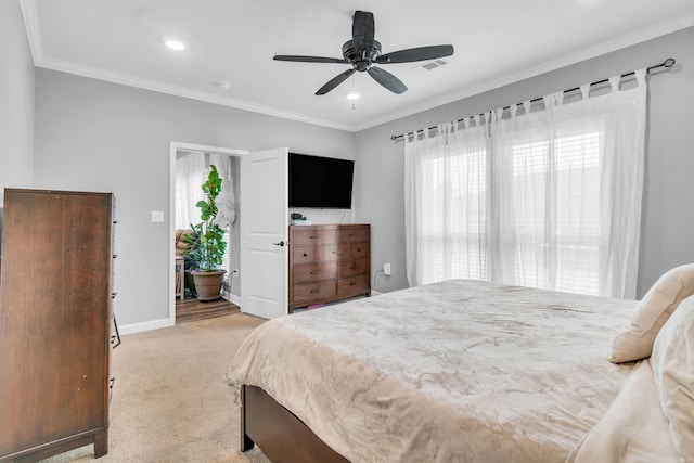 bedroom with a ceiling fan, baseboards, visible vents, ornamental molding, and light colored carpet