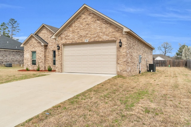 ranch-style house featuring an attached garage, fence, brick siding, and driveway