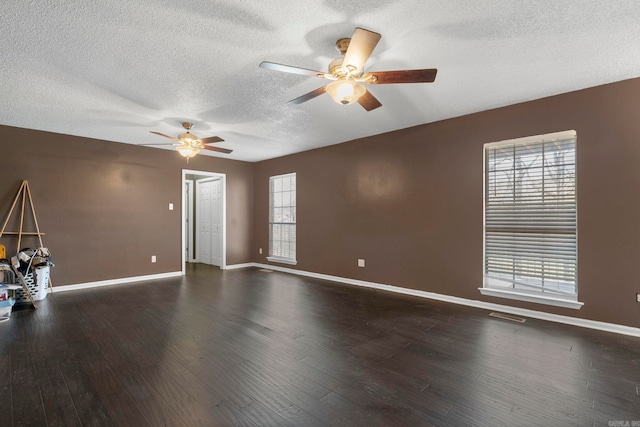 7704 Toltec Dr, North Little Rock, AR 72116 - empty room with baseboards, wood-type flooring, ceiling fan, and a textured ceiling