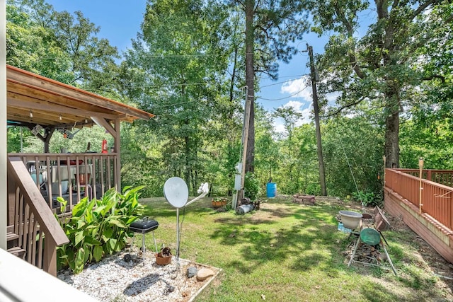 view of yard featuring a deck