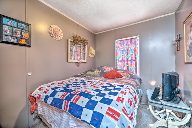 carpeted bedroom with a textured ceiling