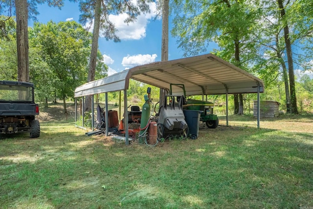 view of parking / parking lot with a detached carport and driveway