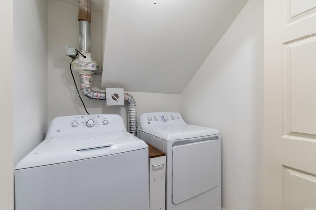 clothes washing area with laundry area and washer and dryer