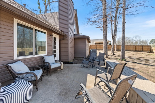 view of patio with fence