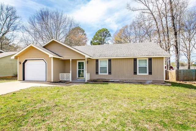 single story home featuring a front lawn, concrete driveway, fence, and a garage