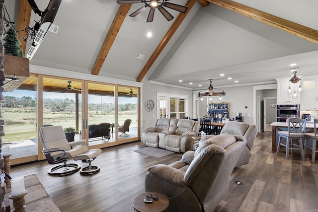 living area featuring beamed ceiling, high vaulted ceiling, and a ceiling fan