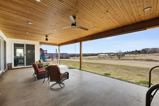 view of patio featuring ceiling fan
