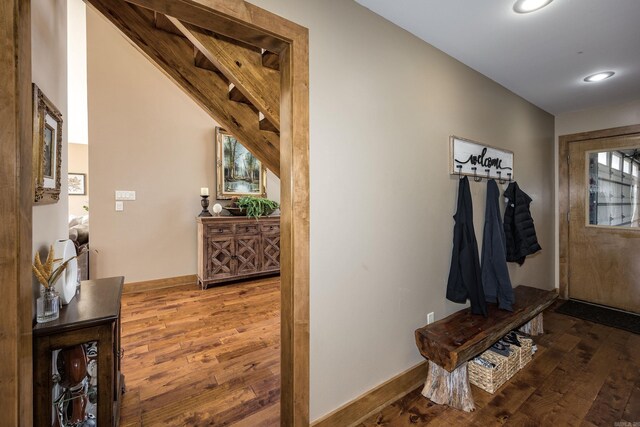 interior space with recessed lighting, wood-type flooring, and baseboards