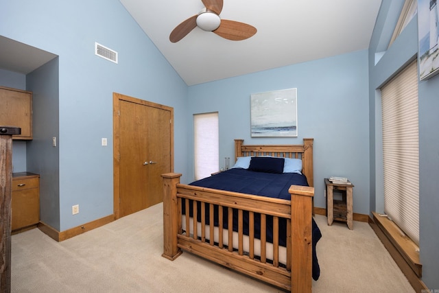 bedroom featuring light carpet, visible vents, baseboards, and ceiling fan