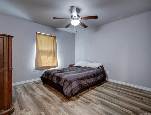 111 Westgate, Hot Springs, AR 71913 - bedroom with baseboards, light wood finished floors, and ceiling fan