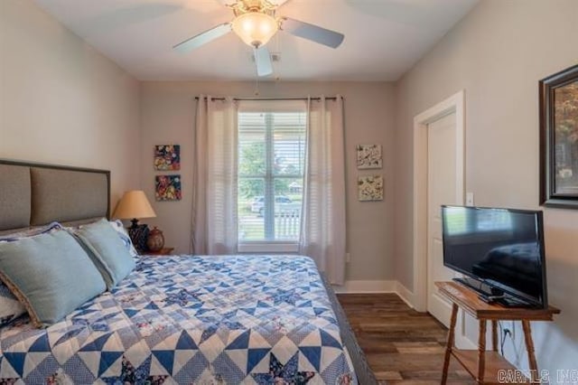 41 Rivers Edge Cv, Heber Springs, AR 72543 - bedroom with baseboards, wood finished floors, and a ceiling fan