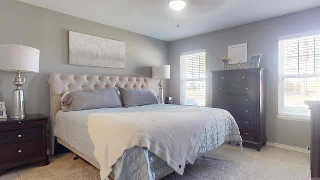 6006 Shadyside, Texarkana, TX 75503 - bedroom featuring light tile patterned floors, baseboards, and multiple windows