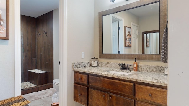 6006 Shadyside, Texarkana, TX 75503 - bathroom featuring toilet, vanity, a stall shower, and tile patterned flooring