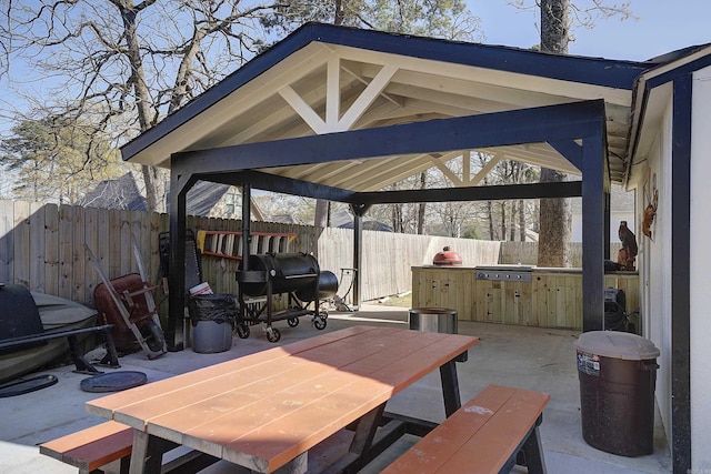 6006 Shadyside, Texarkana, TX 75503 - view of patio / terrace featuring fence, a gazebo, outdoor dining space, and grilling area