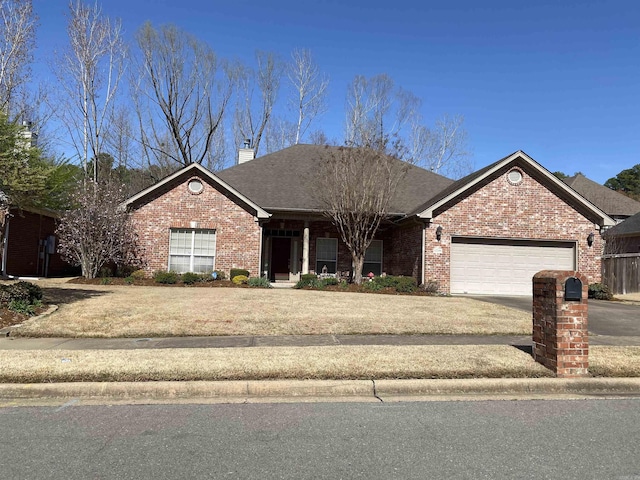 12706 Meadows Edge Ln, Little Rock, AR 72211 - ranch-style home featuring driveway, roof with shingles, a chimney, brick siding, and a garage