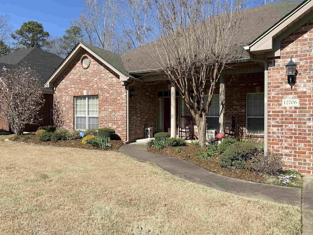 12706 Meadows Edge Ln, Little Rock, AR 72211 - single story home featuring brick siding and a front lawn