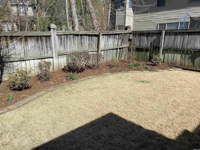 12706 Meadows Edge Ln, Little Rock, AR 72211 - view of yard featuring a fenced backyard