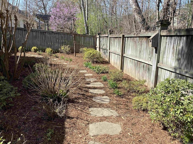 12706 Meadows Edge Ln, Little Rock, AR 72211 - view of yard featuring a fenced backyard