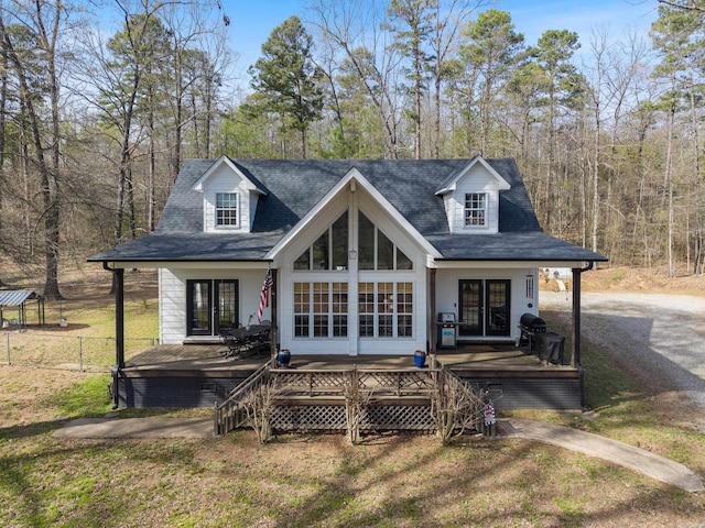 8 Allen Pt, Perryville, AR 72126 - back of property featuring a lawn, french doors, and roof with shingles