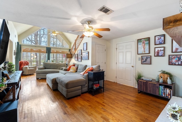 8 Allen Pt, Perryville, AR 72126 - living area featuring visible vents, light wood-style flooring, ceiling fan, and vaulted ceiling
