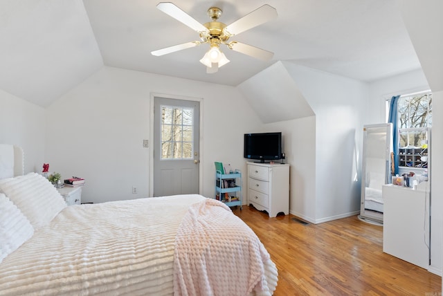 8 Allen Pt, Perryville, AR 72126 - bedroom with baseboards, vaulted ceiling, a ceiling fan, and light wood finished floors