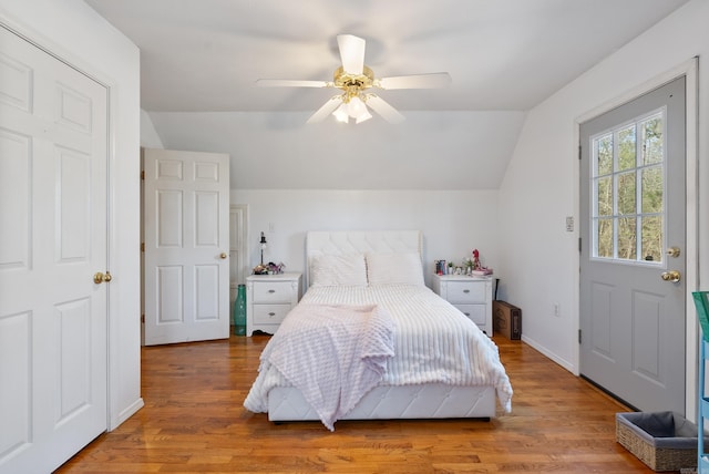 8 Allen Pt, Perryville, AR 72126 - bedroom featuring baseboards, lofted ceiling, ceiling fan, and wood finished floors