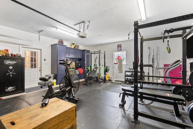 8 Allen Pt, Perryville, AR 72126 - workout area featuring attic access and a textured ceiling