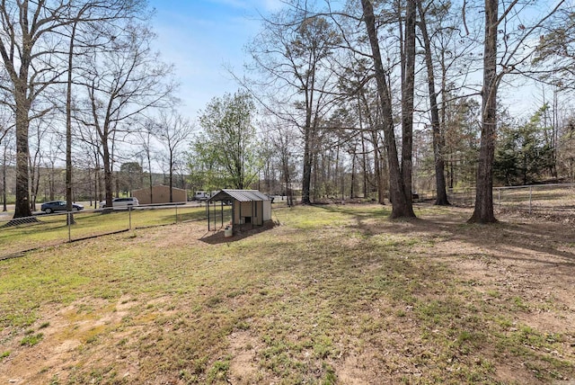 8 Allen Pt, Perryville, AR 72126 - view of yard featuring fence, exterior structure, and an outdoor structure