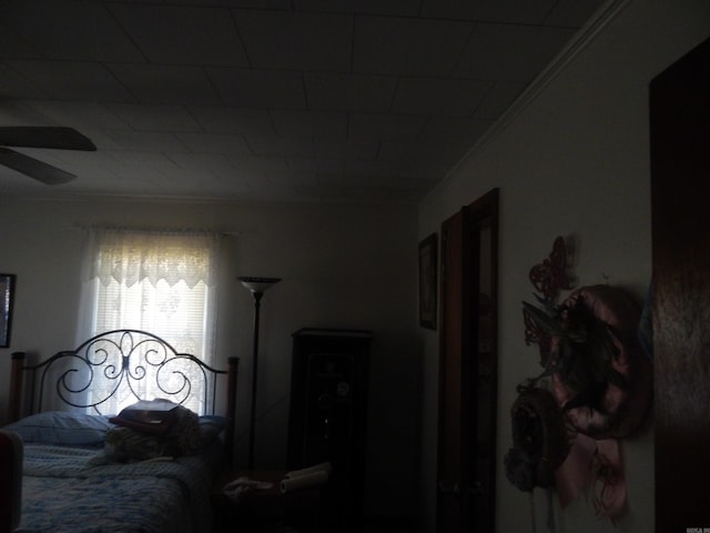 bedroom featuring crown molding