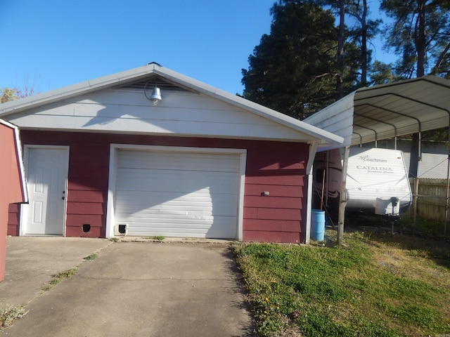 garage with a detached carport