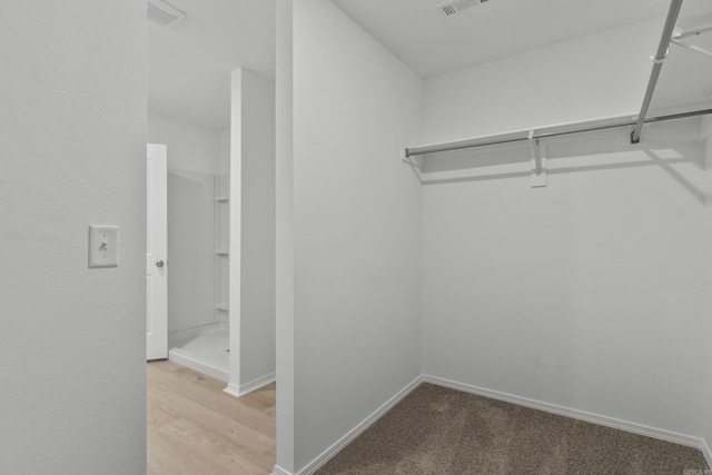 1233 Santa Fe Trl, Bauxite, AR 72011 - walk in closet featuring light wood-style floors
