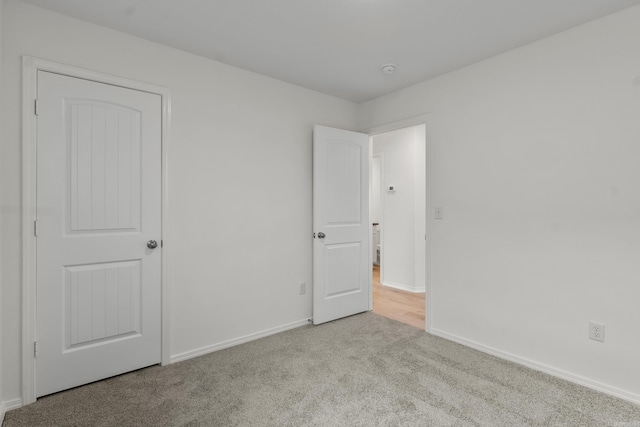 1233 Santa Fe Trl, Bauxite, AR 72011 - unfurnished bedroom featuring carpet floors and baseboards