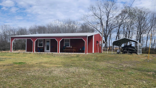 44 Duncan Ln, Story, AR 71970 - view of pole building featuring covered porch, a carport, and a lawn