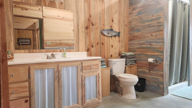 44 Duncan Ln, Story, AR 71970 - bathroom with unfinished concrete floors, wooden walls, toilet, and vanity