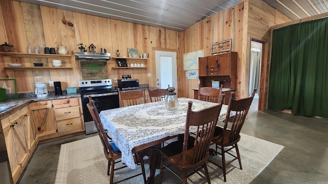44 Duncan Ln, Story, AR 71970 - dining area featuring concrete floors and wooden walls