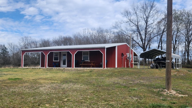 44 Duncan Ln, Story, AR 71970 - view of pole building featuring a carport and a yard