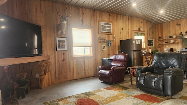 44 Duncan Ln, Story, AR 71970 - carpeted living area featuring a wall unit AC and wood walls