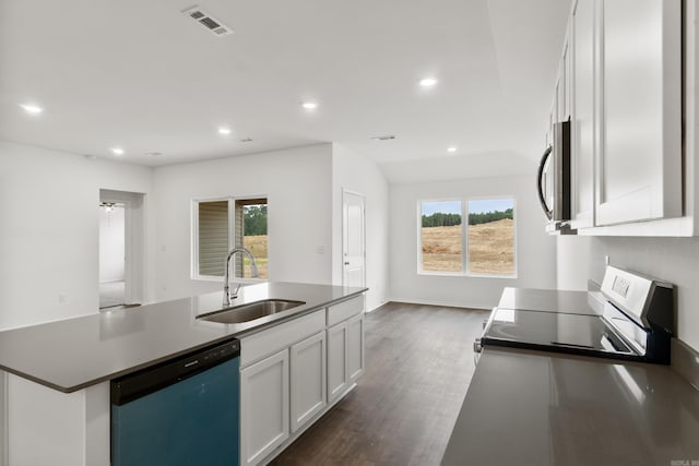 11089 River Valley Dr, Hensley, AR 72065 - kitchen featuring appliances with stainless steel finishes, white cabinetry, recessed lighting, a kitchen island with sink, and dark wood finished floors