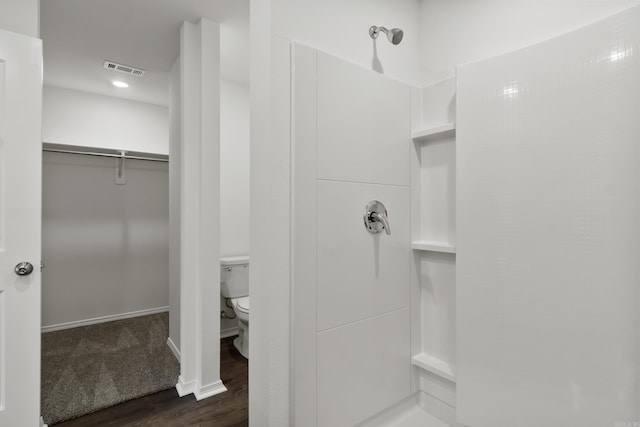 11089 River Valley Dr, Hensley, AR 72065 - full bathroom featuring wood finished floors, a shower, and a walk in closet