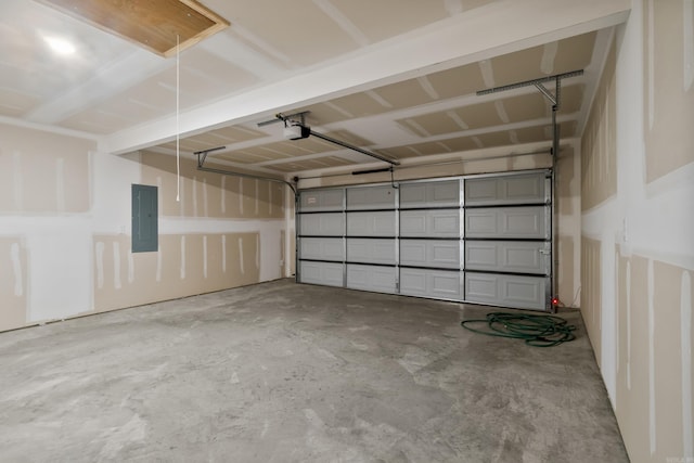 11089 River Valley Dr, Hensley, AR 72065 - garage with a garage door opener and electric panel