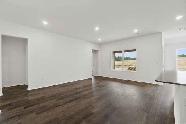 11089 River Valley Dr, Hensley, AR 72065 - unfurnished room with dark wood-style flooring and recessed lighting
